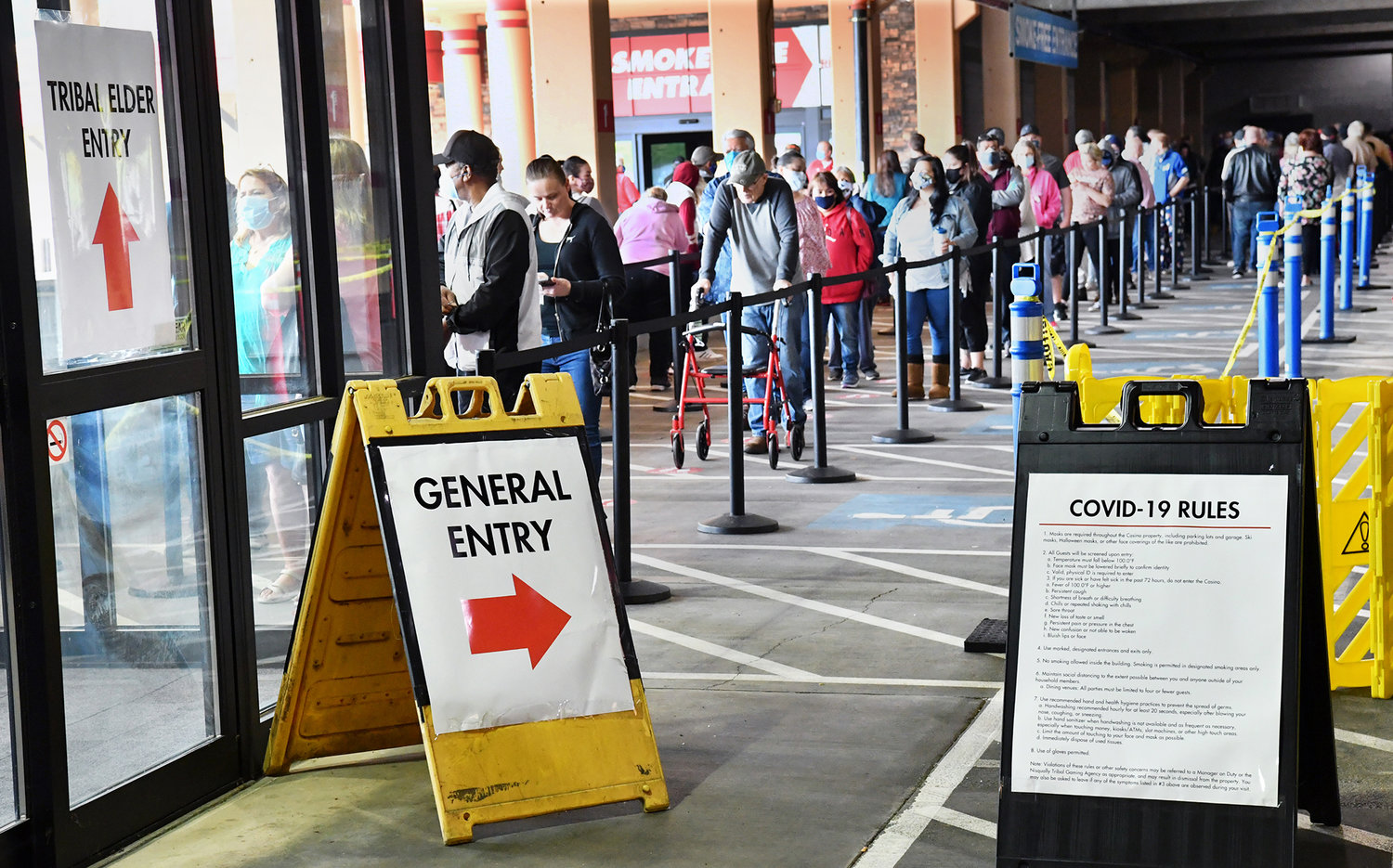 FILE PHOTO — Patrons line up to enter the Nisqually Tribe's Red Wind Casino on Monday, May 18. The casino had been closed since mid-March because of the coronavirus, but decided it was safe enough to open while taking precautions to keep visitors and staff safe. 