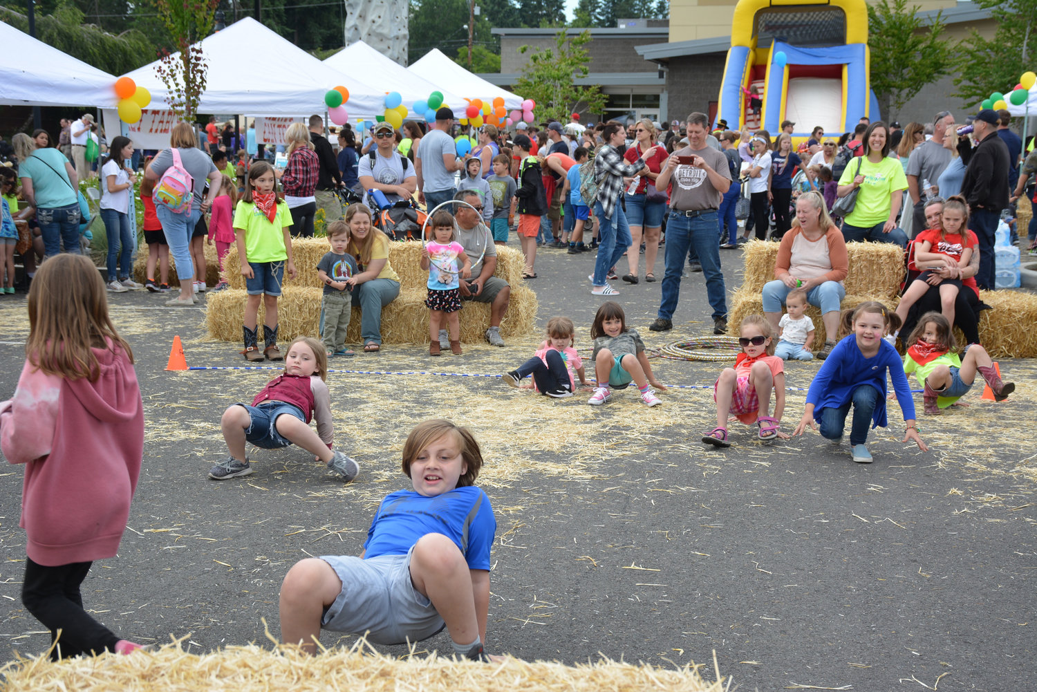 Kids at previous Yelm’s Prairie Days event take part in a crab-walking race.