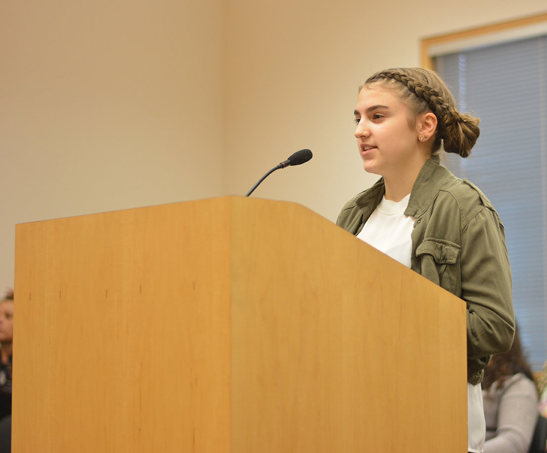 Seventh grader Gabrielle Hollenbeck presents to the Yelm City Council the class project effort to reduce underage drug use at the Yelm Skatepark.