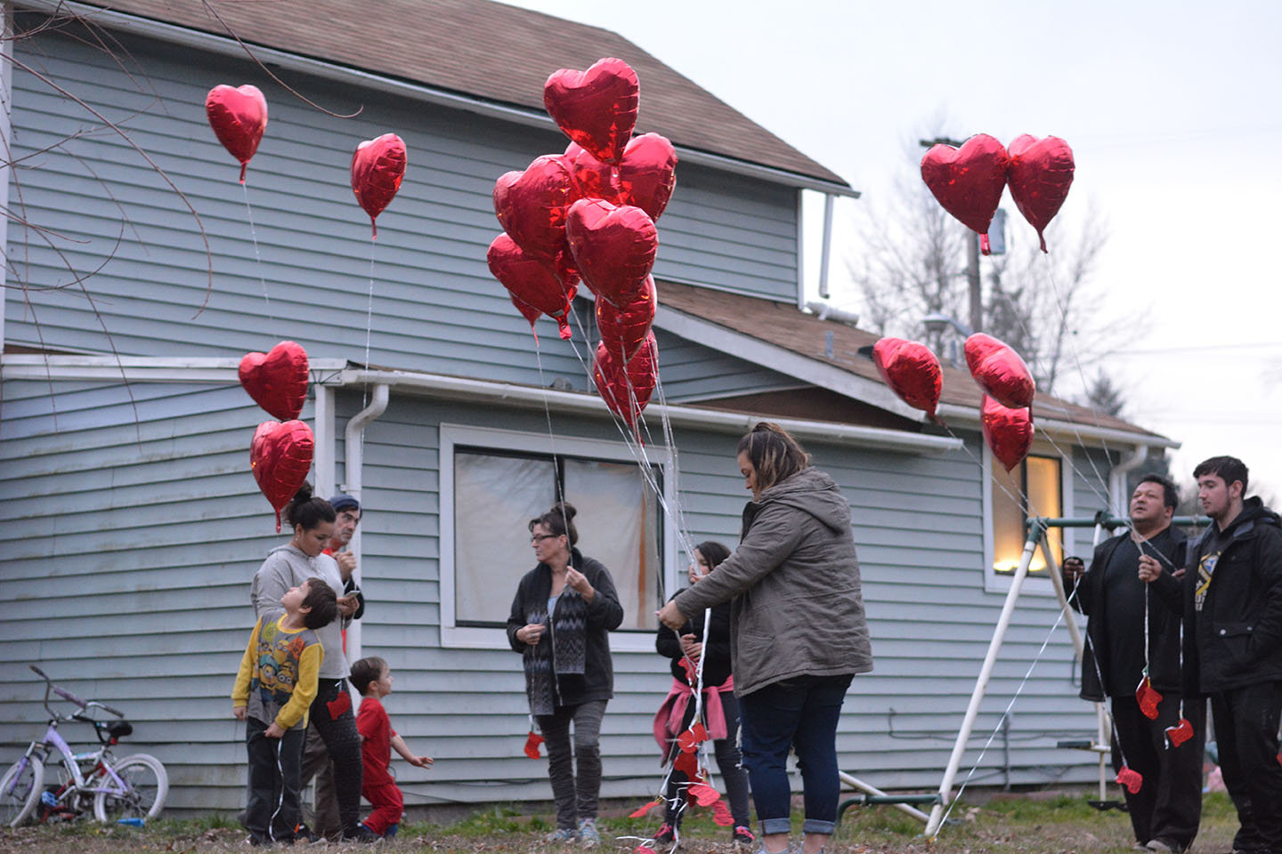 Martin "Tino" Valencia's family prepares to release 20 balloons on Tuesday as tribute to his memory. Tino was killed while riding his bike last August.