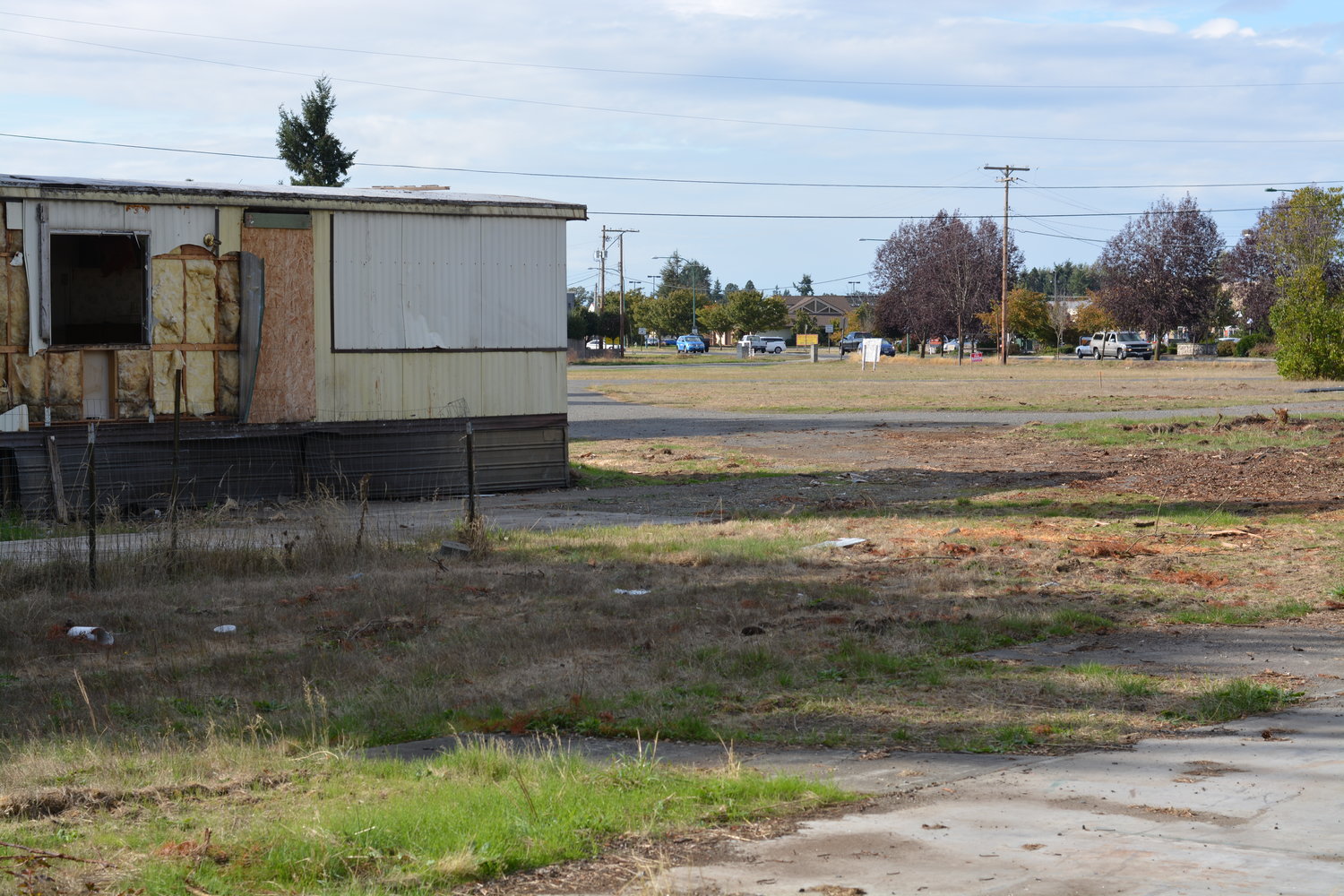 A decrepit trailer sits on the lot just east of Safeway in Yelm. A development company has applied to build a Grocery Outlet on the site.
