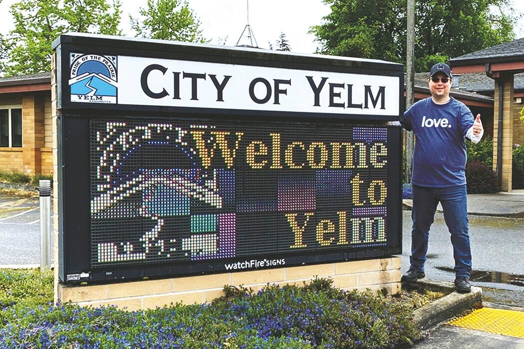 Yem resident Valentin Fyrst shouts it out for the city of Yelm recently as part of his "Spread the Community #love campaign."