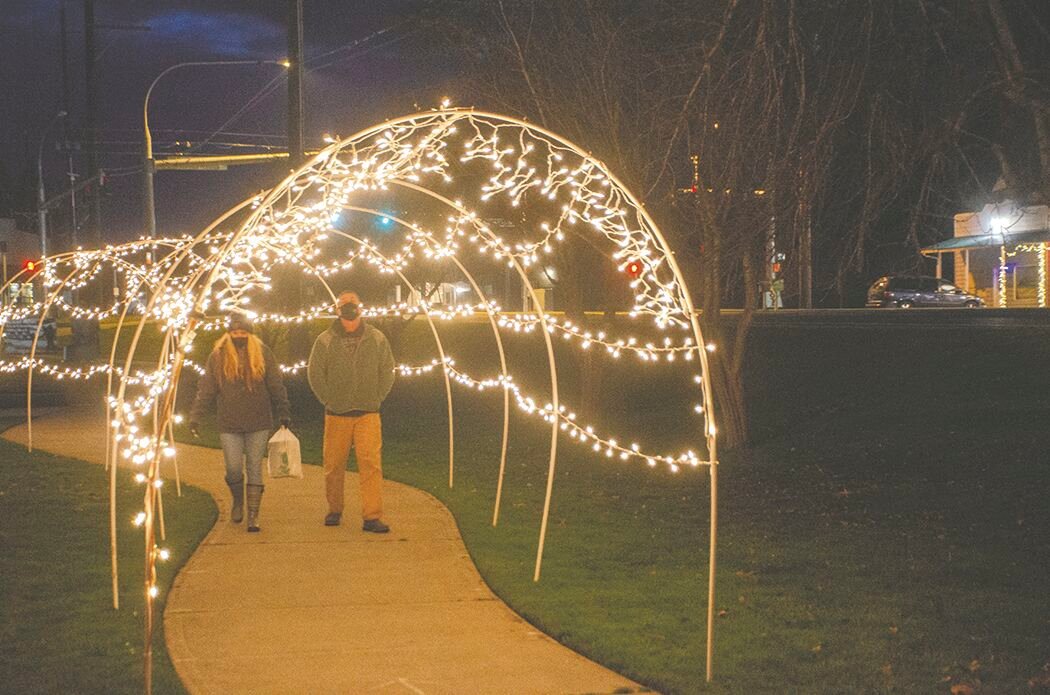 Shortly after the ceremony, people began walking through the light tunnel at Yelm City Park. 