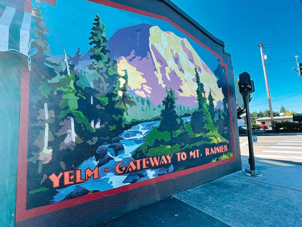 Arts Commissioner Steve Craig had a mural painted on the Wolf building prior to his time on the commission.