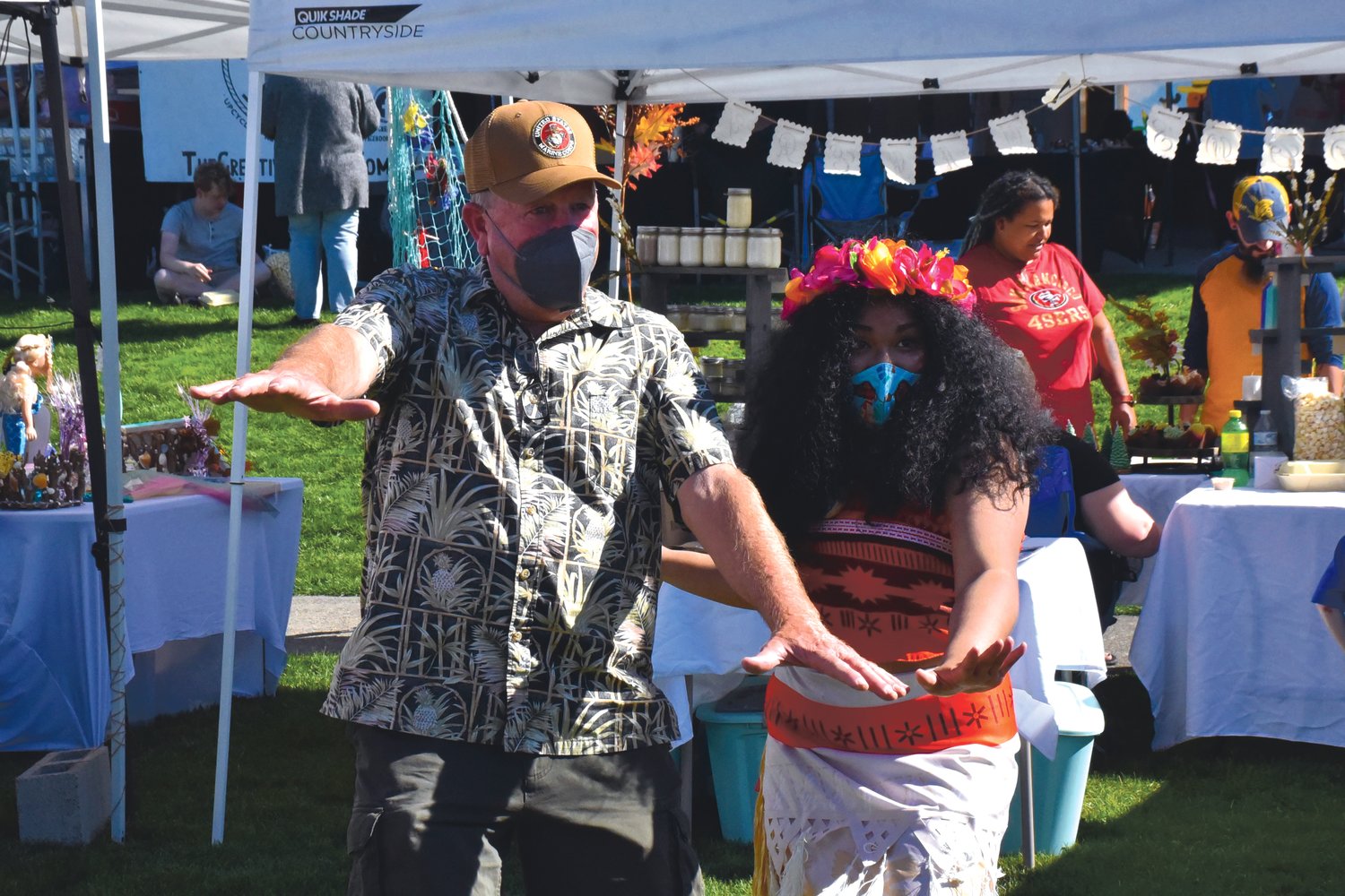 Mayor JW Foster surfs with Moana at the Yelm Fall Harvest Festival on Saturday, Sept. 25 at Yelm City Park.