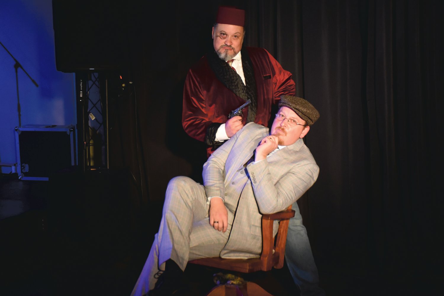 Drew Doyle, bottom, and Dave Champagne pose from a scene from "The 39 Steps," the latest production from Standing Room Only.