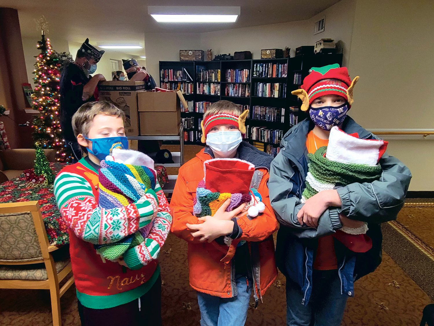 Sons of the American Legion Post 164 prepare to hand out stockings to veterans at asisted living facilities in Yelm on Tuesday, Dec. 21.