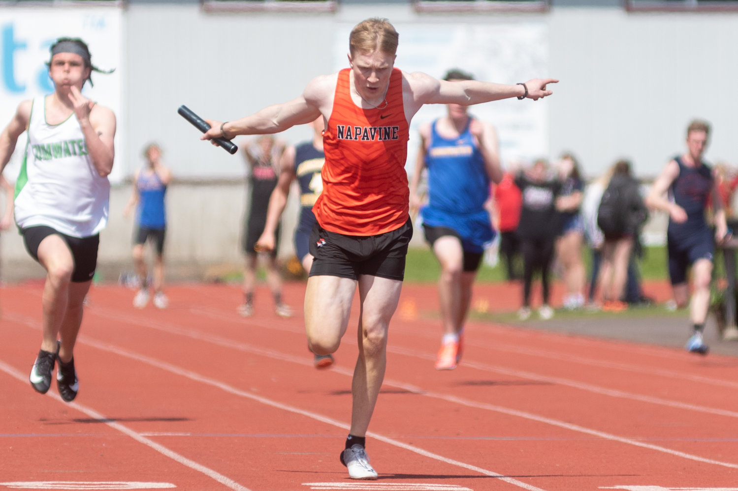 Napavine sprinter Lucas Dahl crosses the finish line in the 4x100-meter relay at the Chehalis Activators Classic at W.F. West April 23.