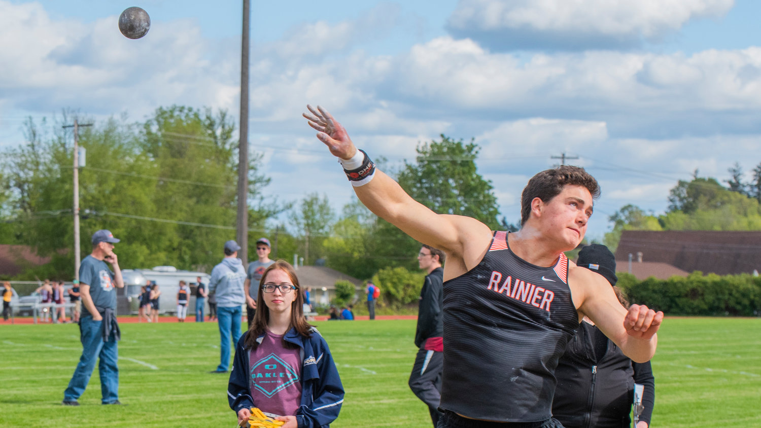 Rainier’s Jeremiah Nubbe throws shotput at W.F. West High School in Chehalis on Friday, May 20, 2022.