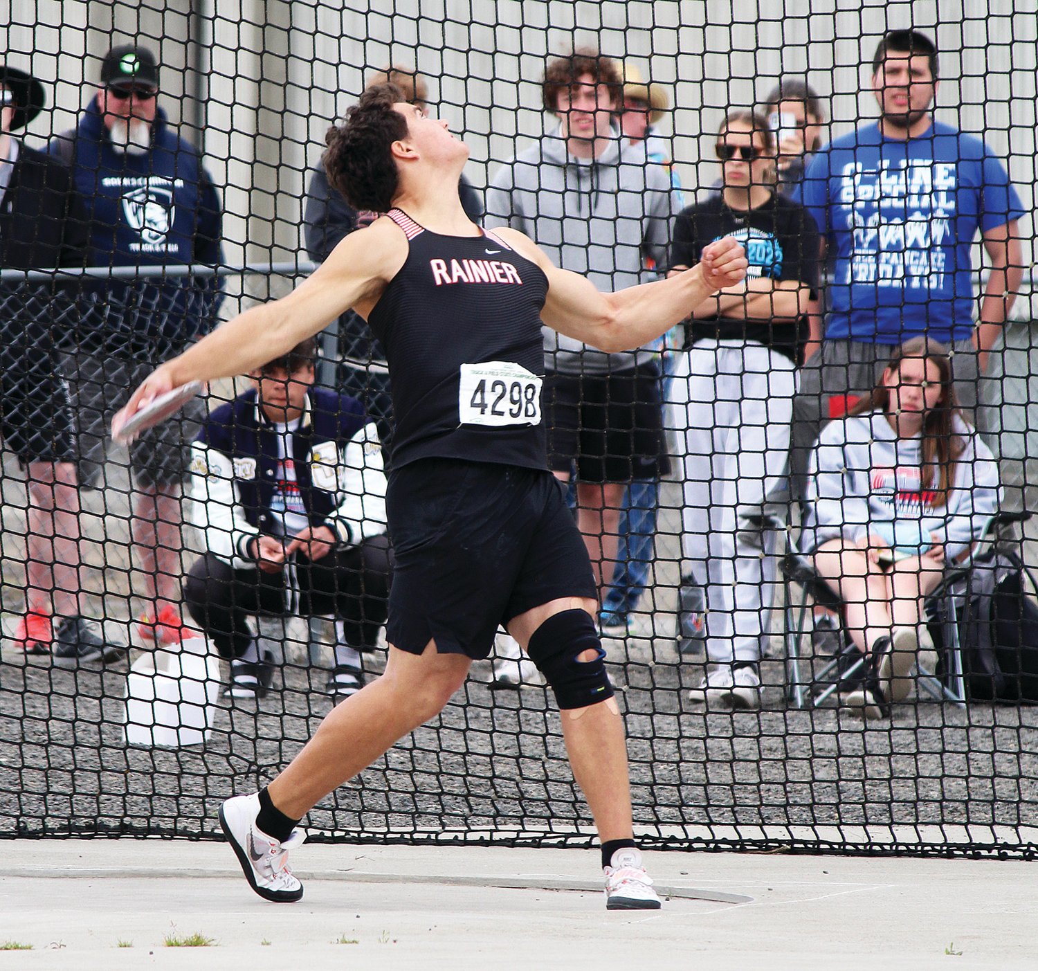 Rainier's Jeremiah Nubbe throws the discus during the State 1B/2B/1A Track and Field Championships in Cheney on Friday, May 27, 2022. He would go on to win the state title in the discus and set a new meet record.