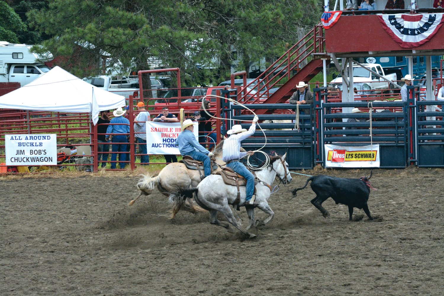 A cowboy prepares to throw his lasso during the team roping event on June 4 at the Roy Pioneer Rodeo.