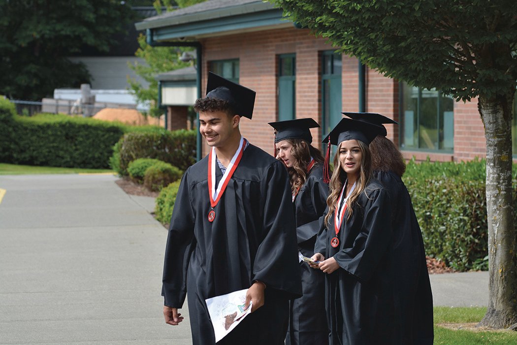 Yelm High School students exit McKenna Elementary School following their grad walk on Wednesday, June 15.