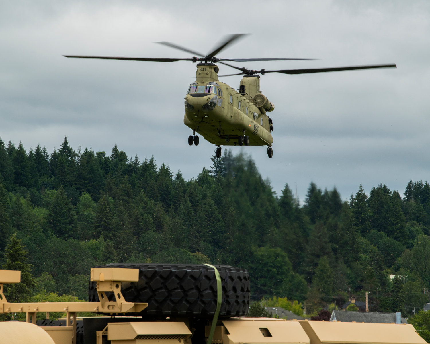 A Chinook helicopter prepares to land at the Chehalis-Centralia Airport during a military training exercise on Wednesday, June 22.