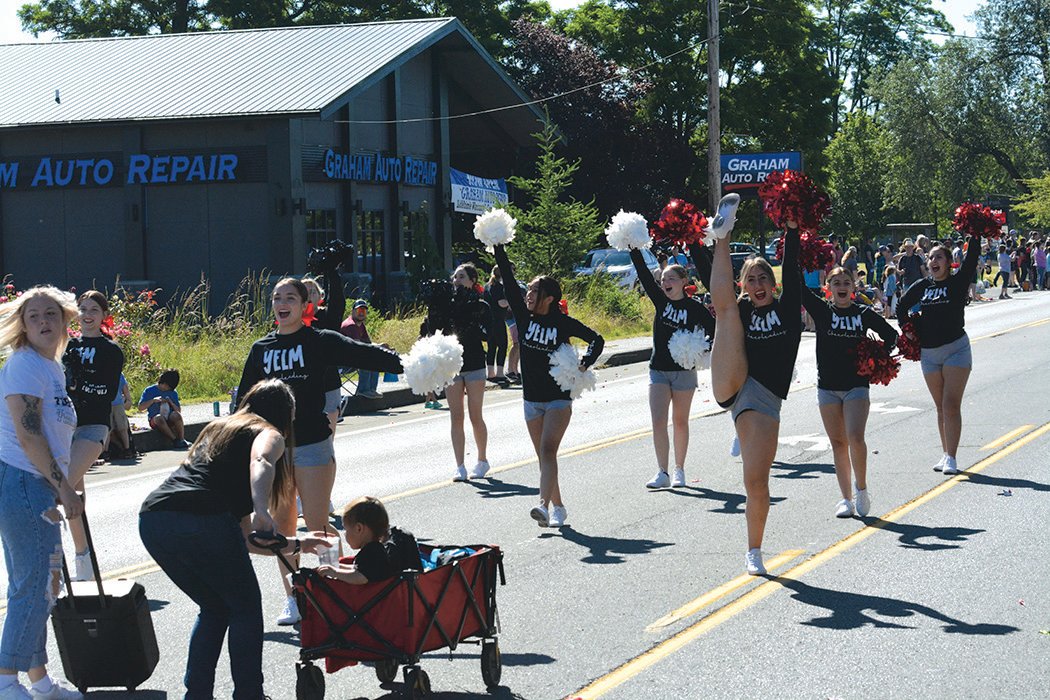 Yelm cheerleaders perform one of their routines during the Prairie Days Parade on June 25.