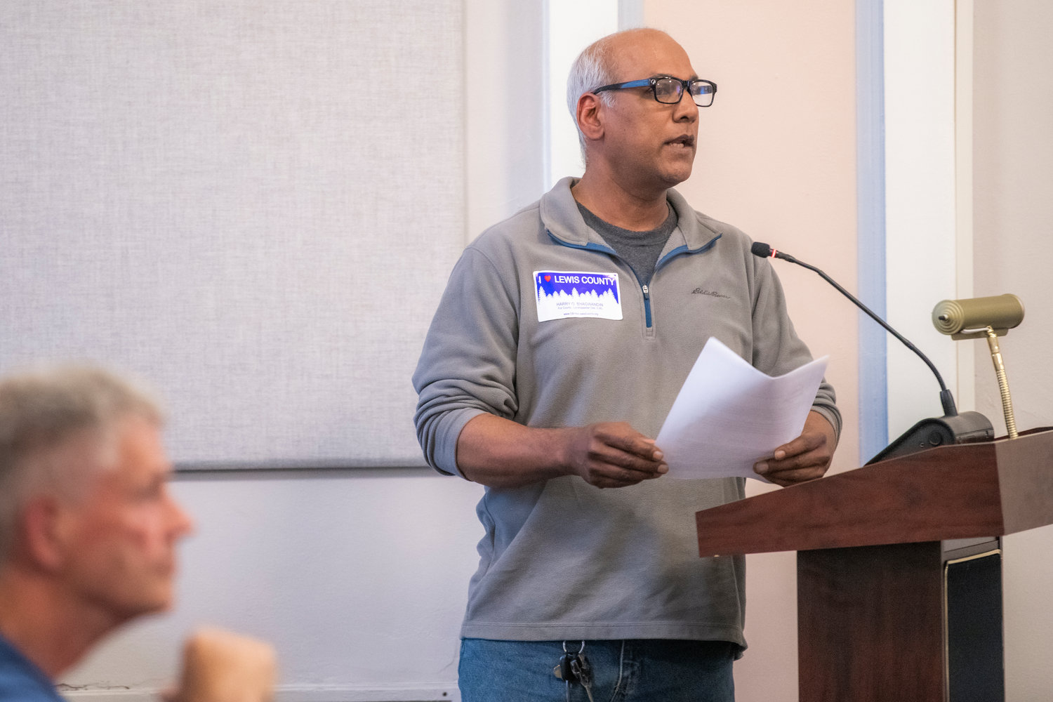 Harry Bhagwandin, a candidate for Lewis County Commission District 3, makes public comment to the Lewis County Planning Commission Tuesday evening during a workshop on a rezone proposal north of Mineral Lake.