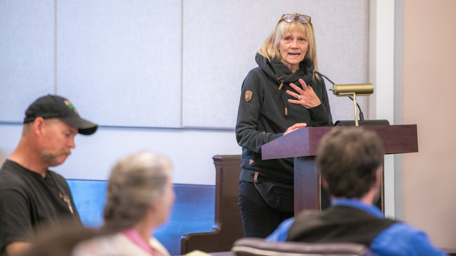 Mineral Resident Jill Labrecque makes public comment to the Lewis County Planning Commission at the Lewis County Courthouse in Chehalis Tuesday. A longtime resident with lakefront property, Labrecque is opposed to a rezone of YMCA land north of the lake.