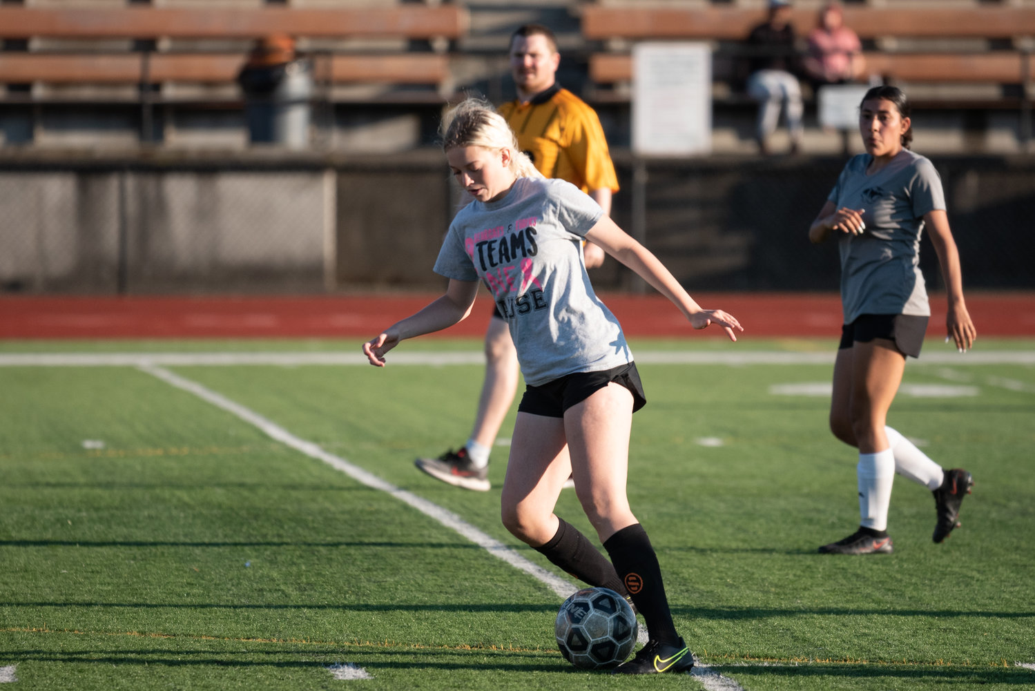 Centralia's Trinity Smith takes the ball upfield against Tenino in a scrimmage at Tiger Stadium Thursday.