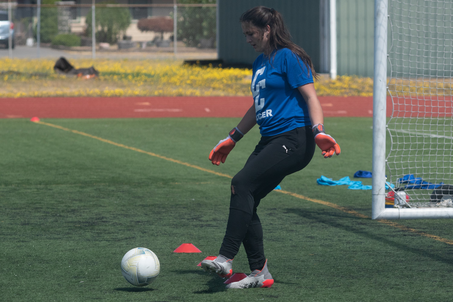 Centralia College keeper Maggie McAuley plays the ball with her feet during a drill at a preseason practice, Aug. 3, 2022.