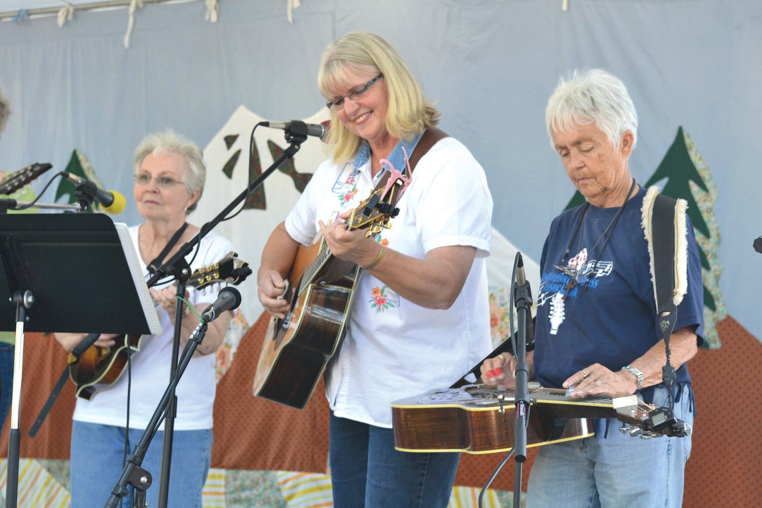 Bluegrass musicians perform in Rainier in this Nisqually Valley News file photo.