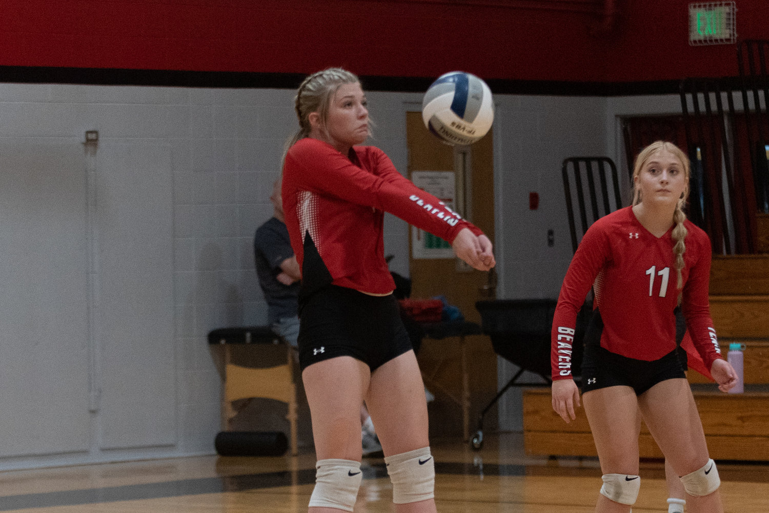 Brianna Asay digs the ball up during Tenino's four-set loss to Centralia on Sept. 14.