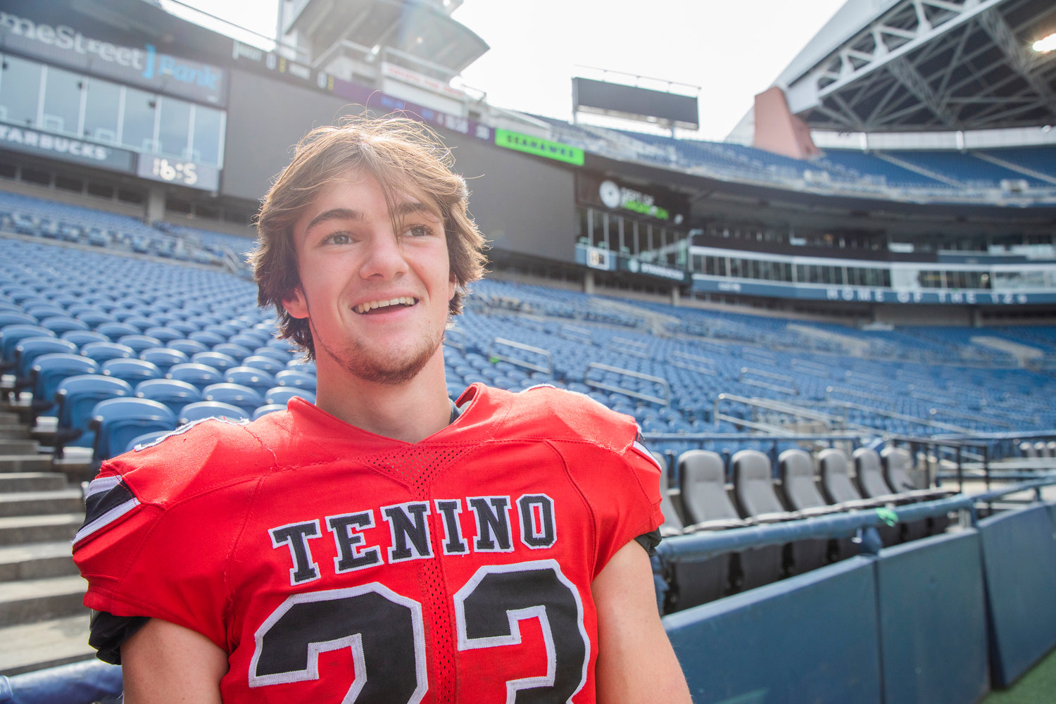 Tenino senior Dylan Spicer (23) smiles while talking about his experience playing at Lumen Field, home of the Seahawks, Saturday afternoon at Lumen Field in Seattle.