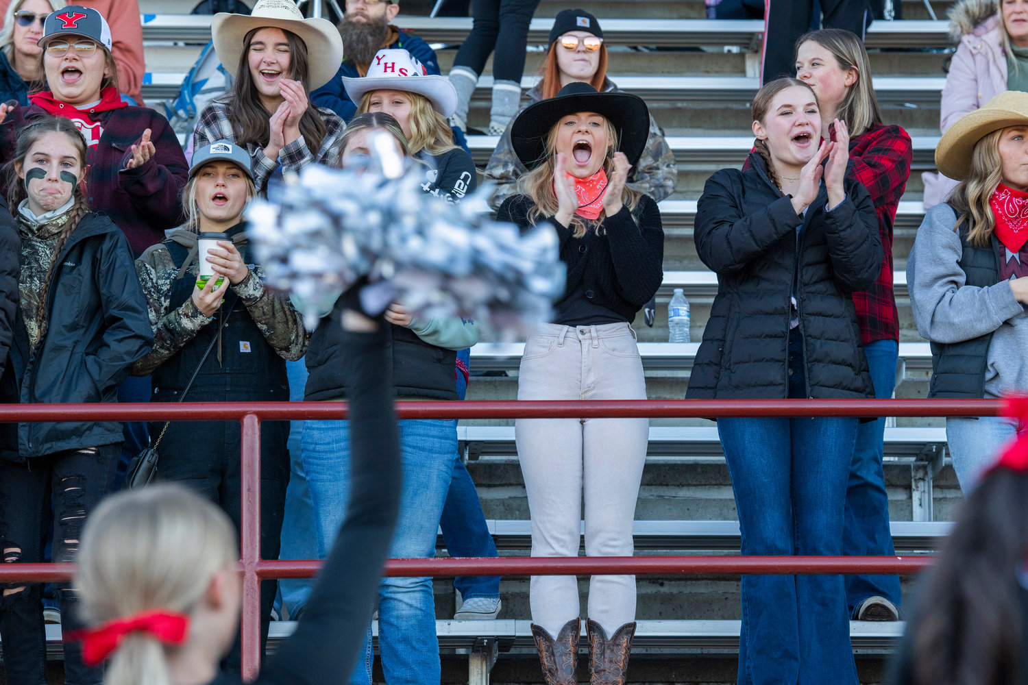 Tornado fans react during a football game on Saturday in Yelm.