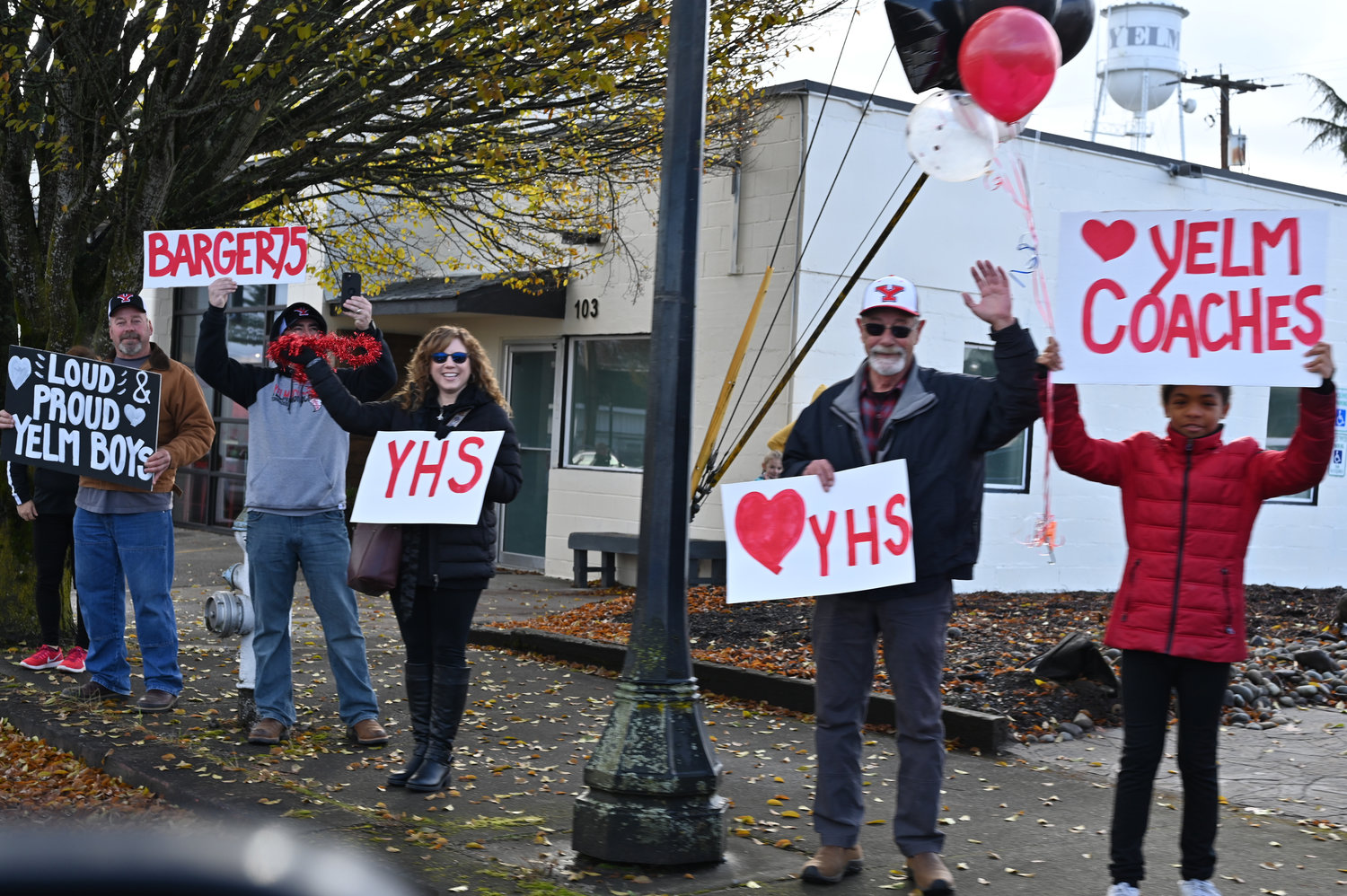 Fans gather on Yelm Avenue in support of the semifinal-bound Tornados on Saturday, Nov. 26.
