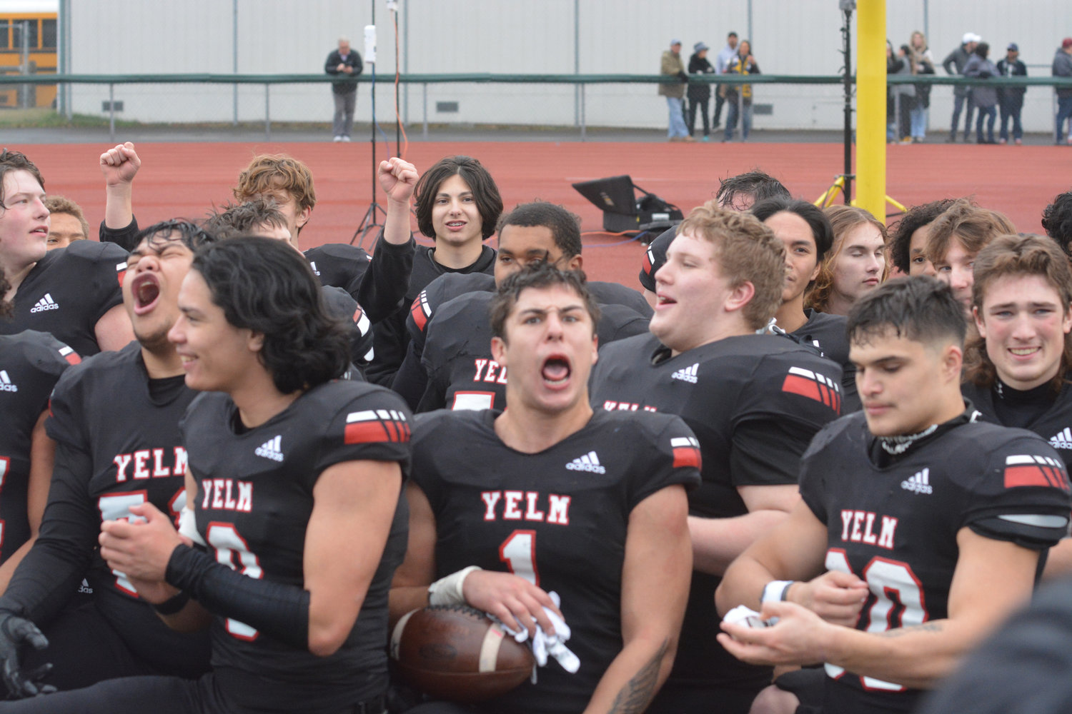 The Tornados cheer after head coach Jason Ronquillo delivers a message following the 28-27 win against Bellevue.