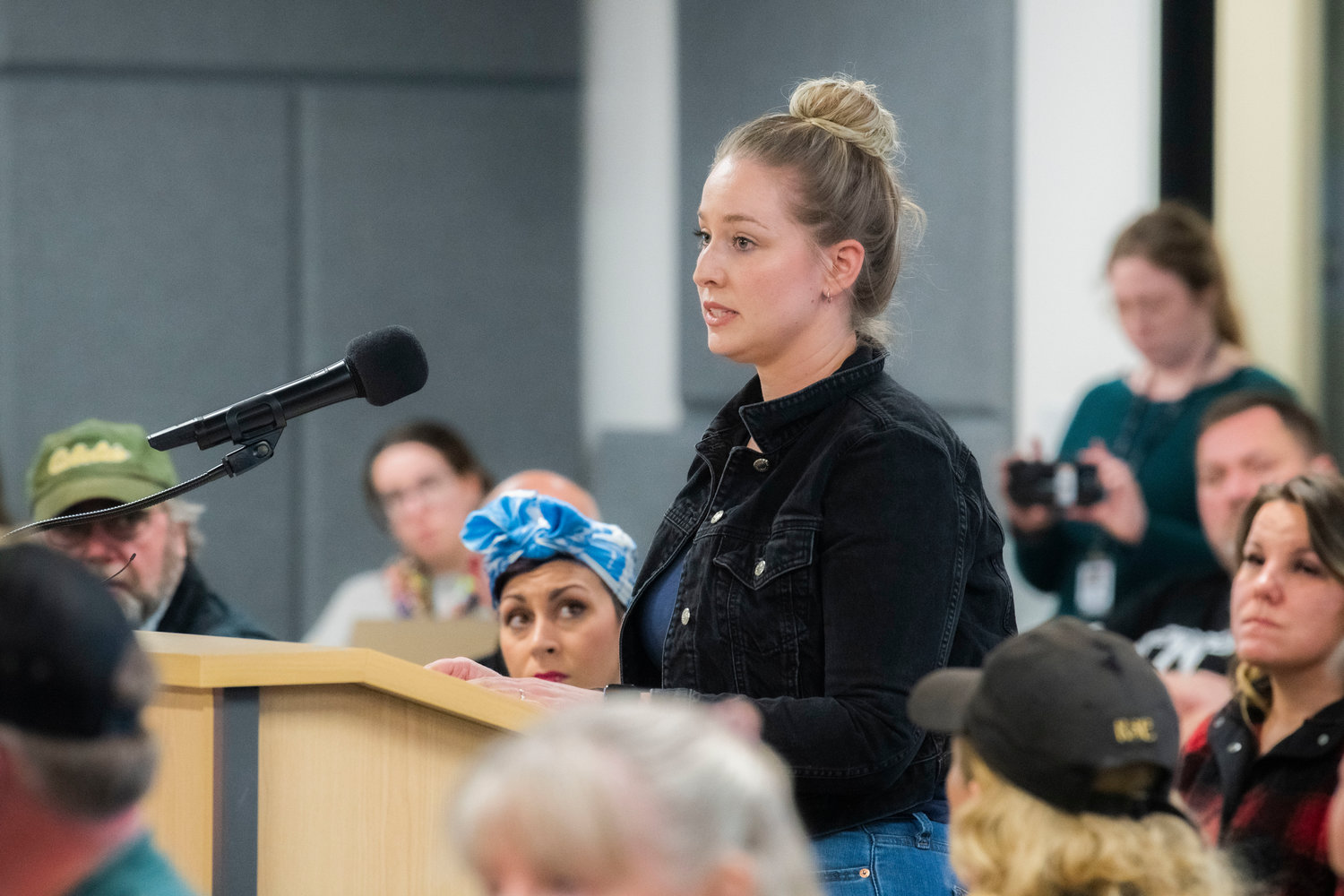Kendahl Tuttle speaks out against a Supreme Living facility in Tenino after creating a Facebook event to “Protest at the Commissioners Meeting,” in Olympia on Tuesday.