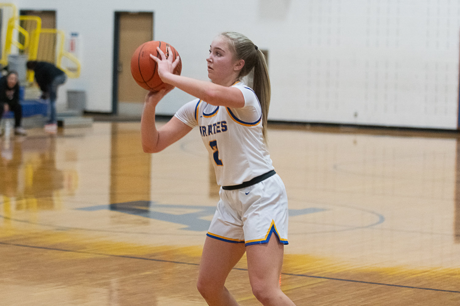 Danika Hallom lines up a 3-pointer during the second half of Adna's 51-47 win over Rainier on Jan. 19.