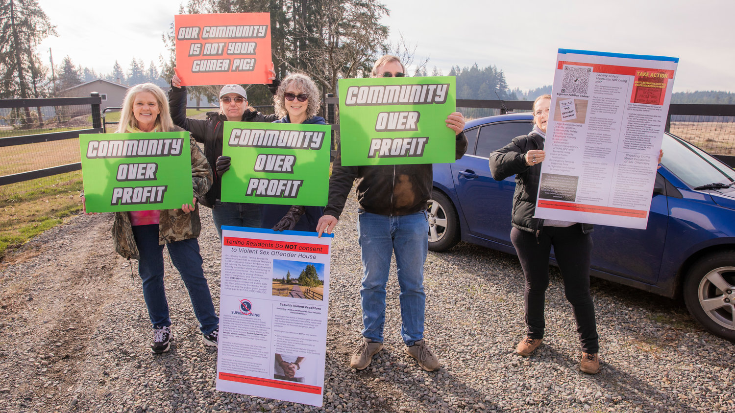 From left, Kathy Taylor, Suzanne Brown, Rachelle Reinitz, a neighbor who brought extra signs and wished to stay anonymous, and Kim Crist who lives across the street, gather for a demonstration outside of the Supreme Living facility located at 2813 140th Ave. SW in Tenino on Wednesday. Officials with the state were scheduled to hold a webinar to address the concerns of area residents on Wednesday night. Coverage of the webinar will be included in Saturday’s edition of The Chronicle.
