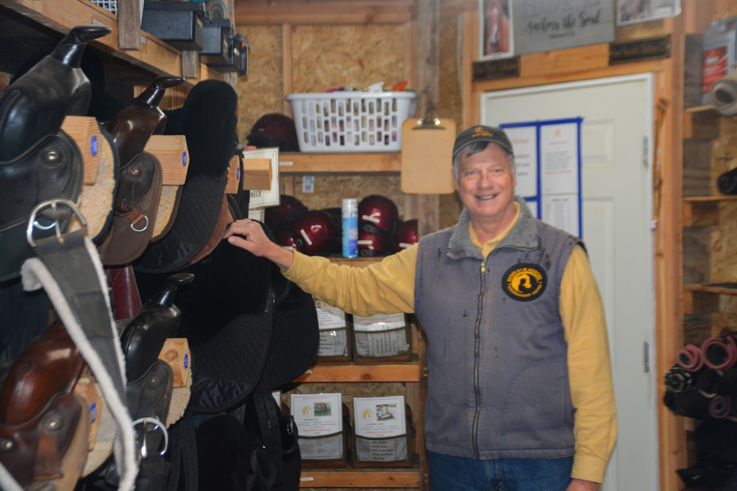 Bob Woelk poses inside the tack room at Hope for Heroes in Yelm.