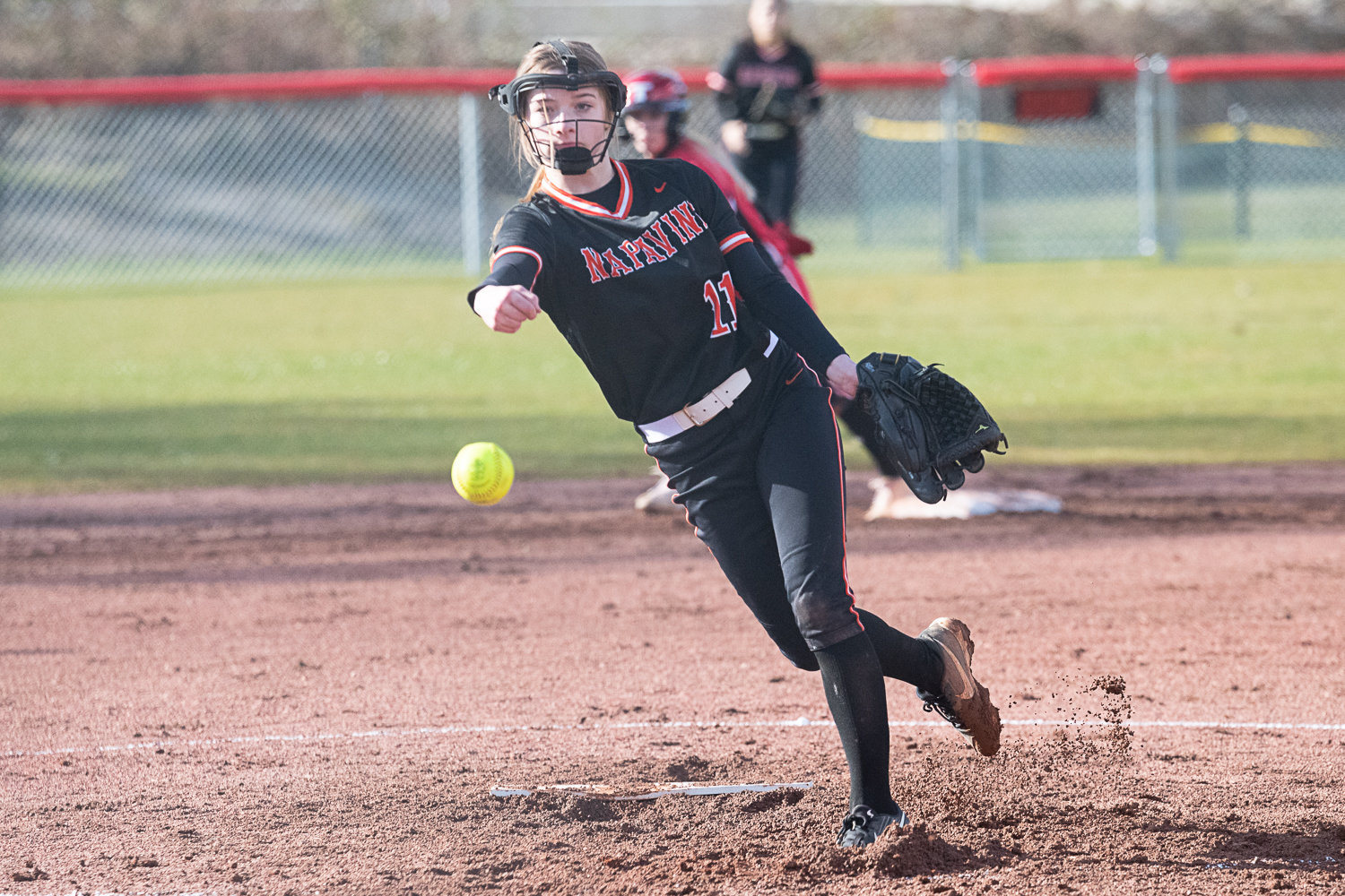 Hannah Fay spins a pitch during Napavine's 27-8 win over Tenino on March 14.