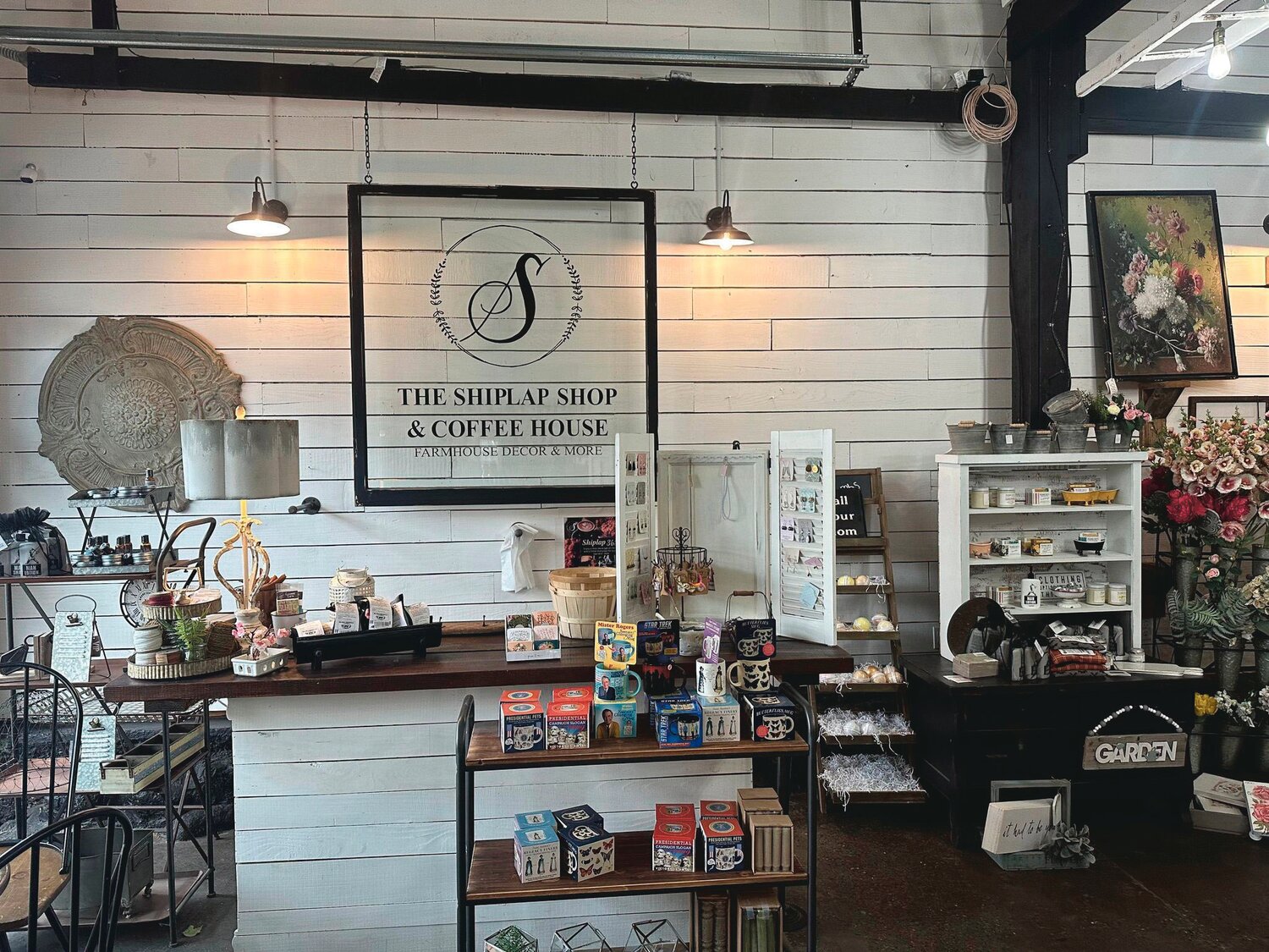 Items like mugs and puzzles are available for purchase at Shiplap Shop and Coffee House in Yelm.