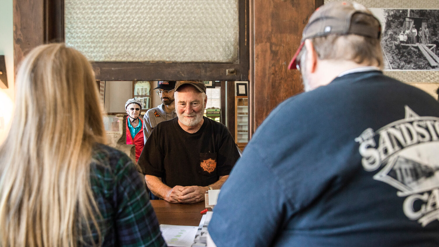 A line forms in the Tenino Depot Museum on Friday morning as co-authors Jessica Reeves-Rush and Rich Edwards sell their new book detailing 150 years of history in Tenino.