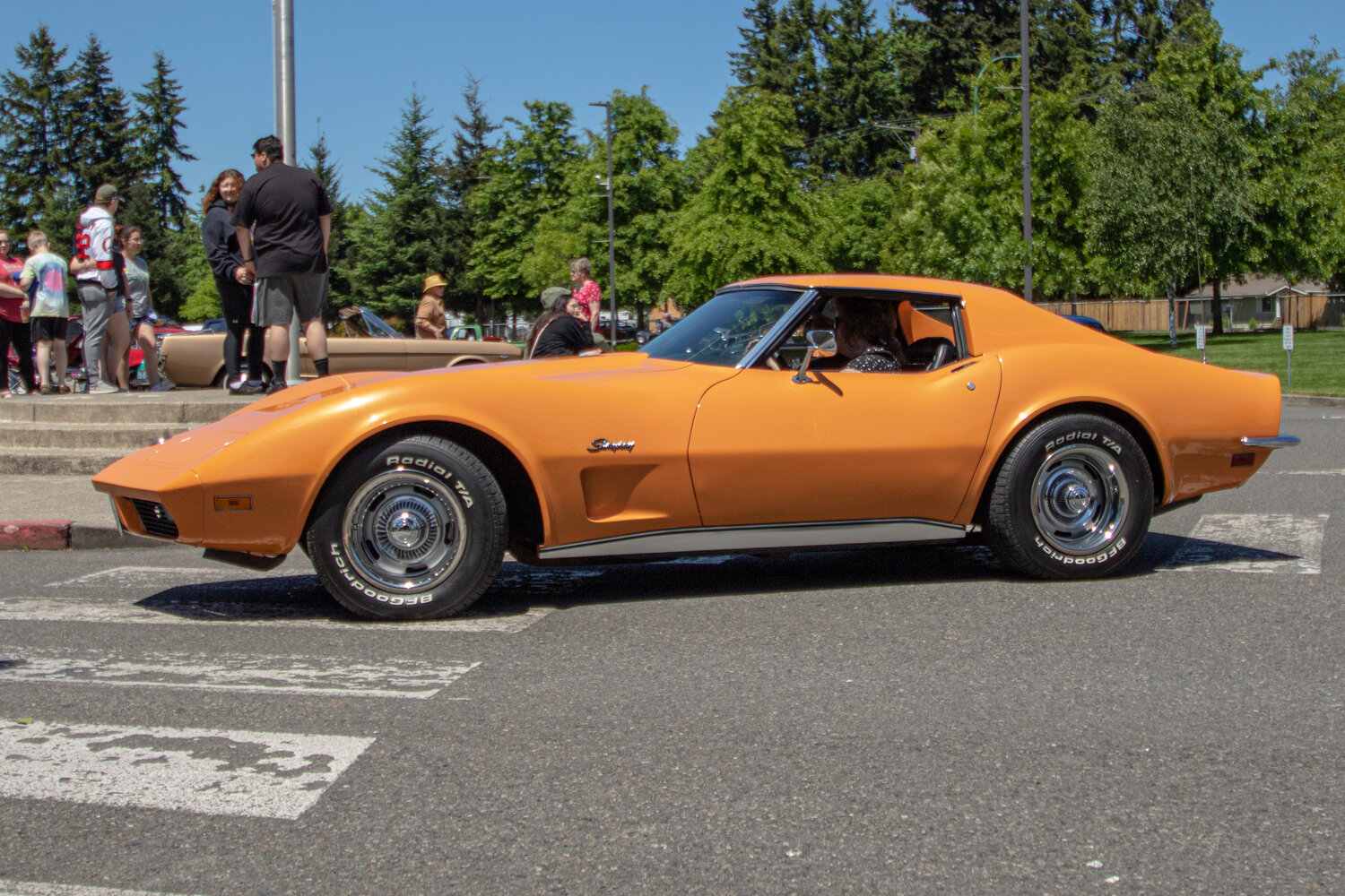 Jim and Lori Champion leave the Yelm High School car show in their 1973 Chevrolet Corvette Stingray on Sunday, June 4.