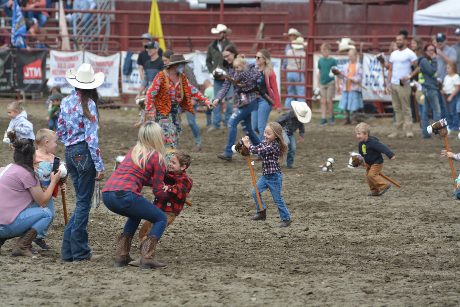 Rodeo youngsters compete in the annual “Sunday stick-horse race” at the Roy Rodeo on Sept. 3.
