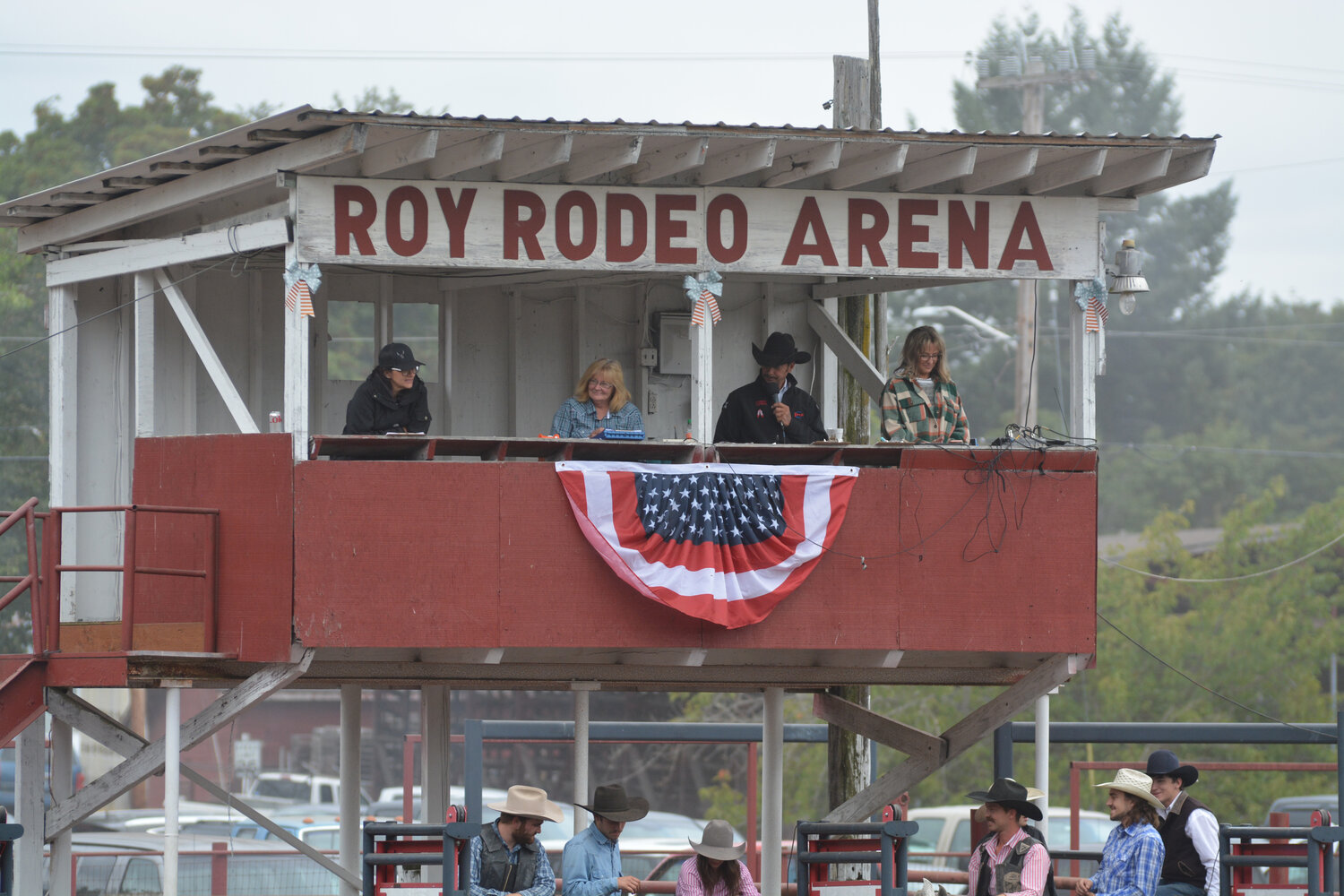 Rodeo announcers watch on from the booth on Sept. 3.