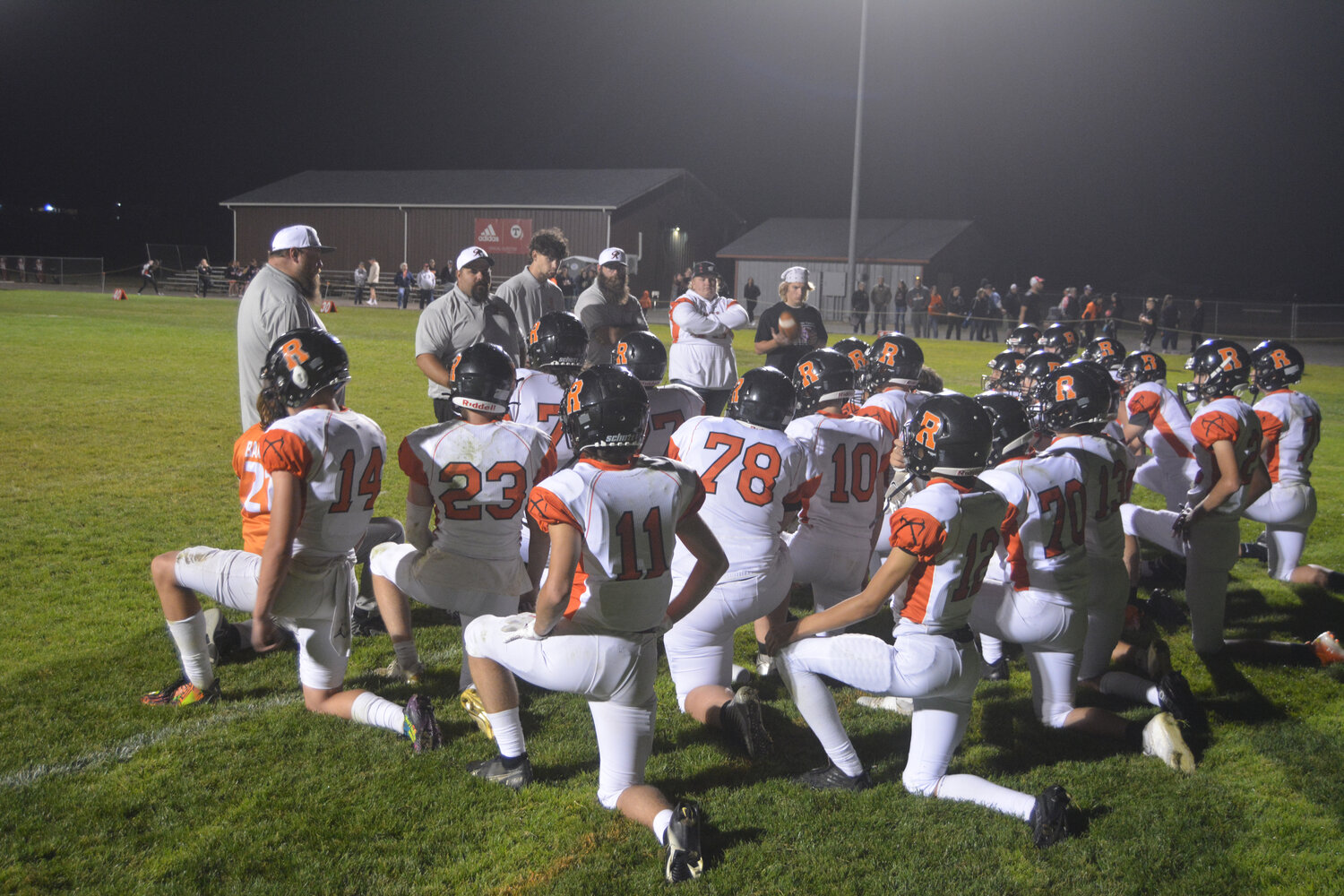 Head Coach Andy Bartell coaches his team after the 54-12 loss to Toledo at Toledo High School on Sept. 8.