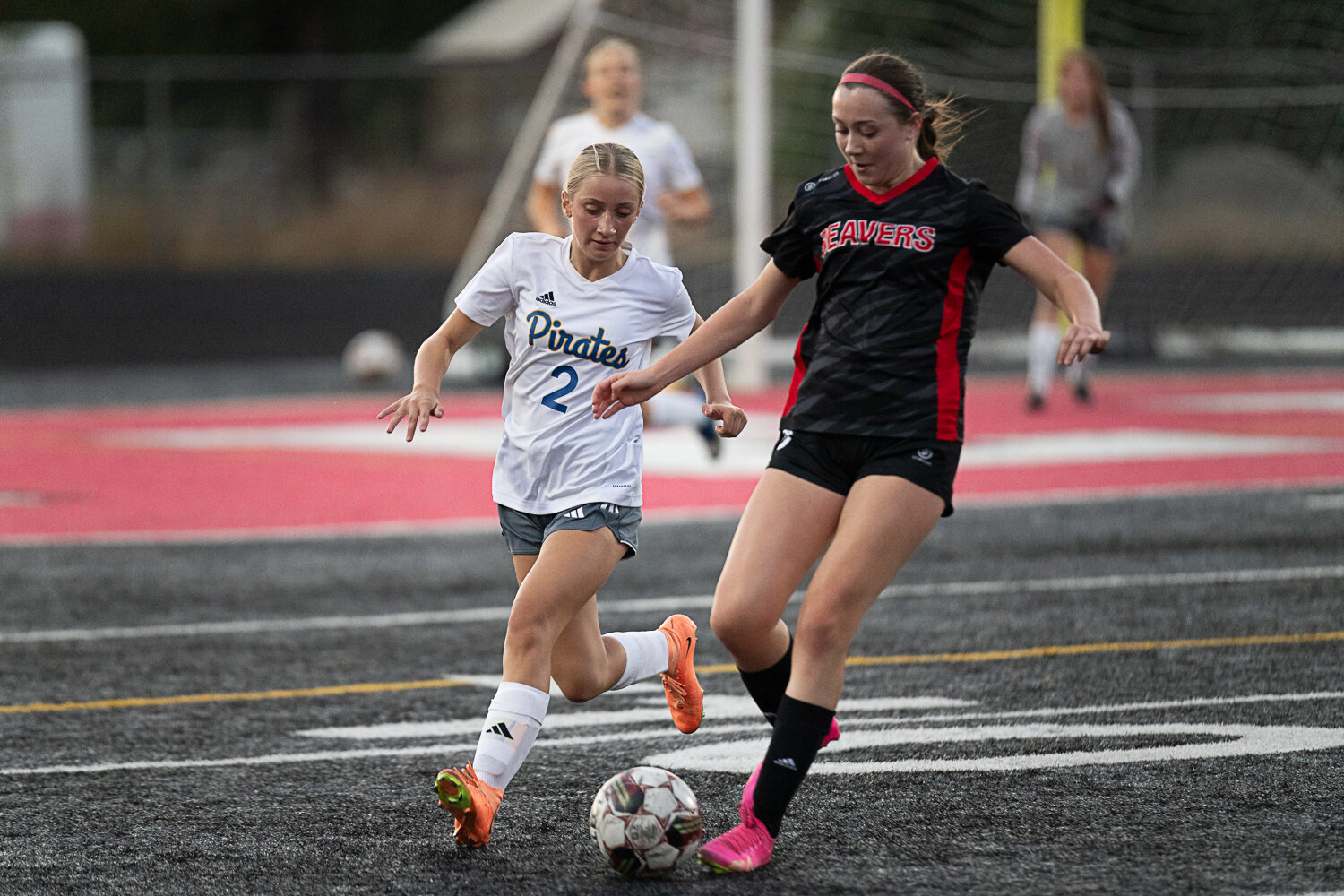 Adna's Sophie Hagseth and Tenino's Abagail Archibald both go for the ball during the first half of a 0-0 draw on Sept. 14.
