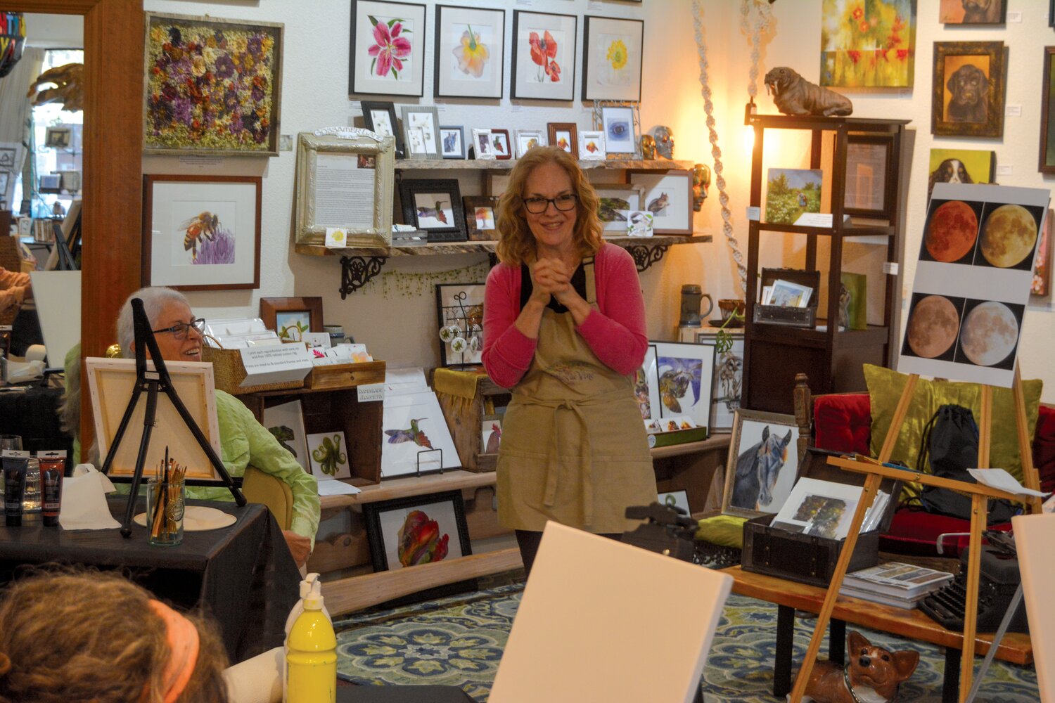 Andrea Levanti greets her Paint & Sip class at InGenius! Gallery & Boutique on Sept. 29.
