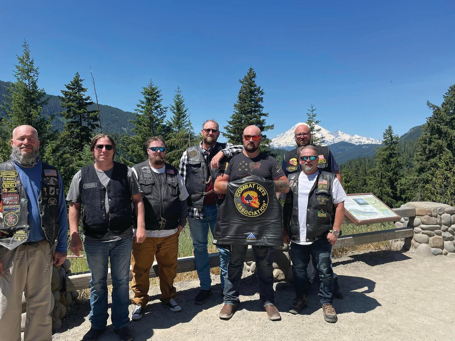 William Warren (back right) and members of the Combat Veterans Motorcycle Association visit Mount Rainier.