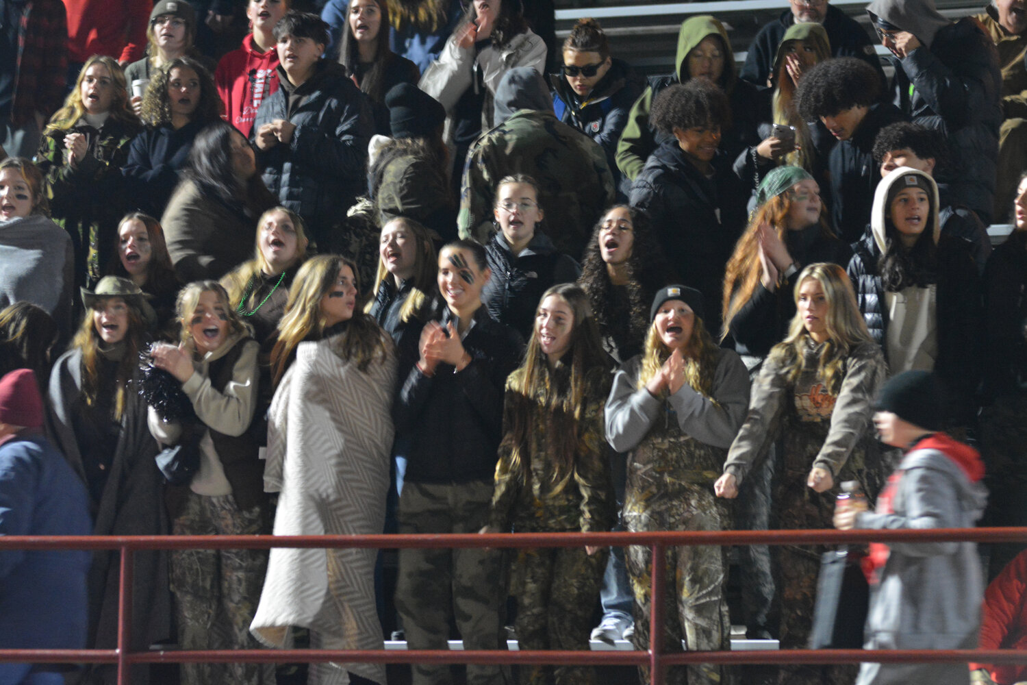 Members of the Tornados student section sing John Denver’s “Take Me Home, Country Roads” after Yelm defeated Mount Tahoma, 29-12, on Nov. 17 in the 3A state quarterfinals.