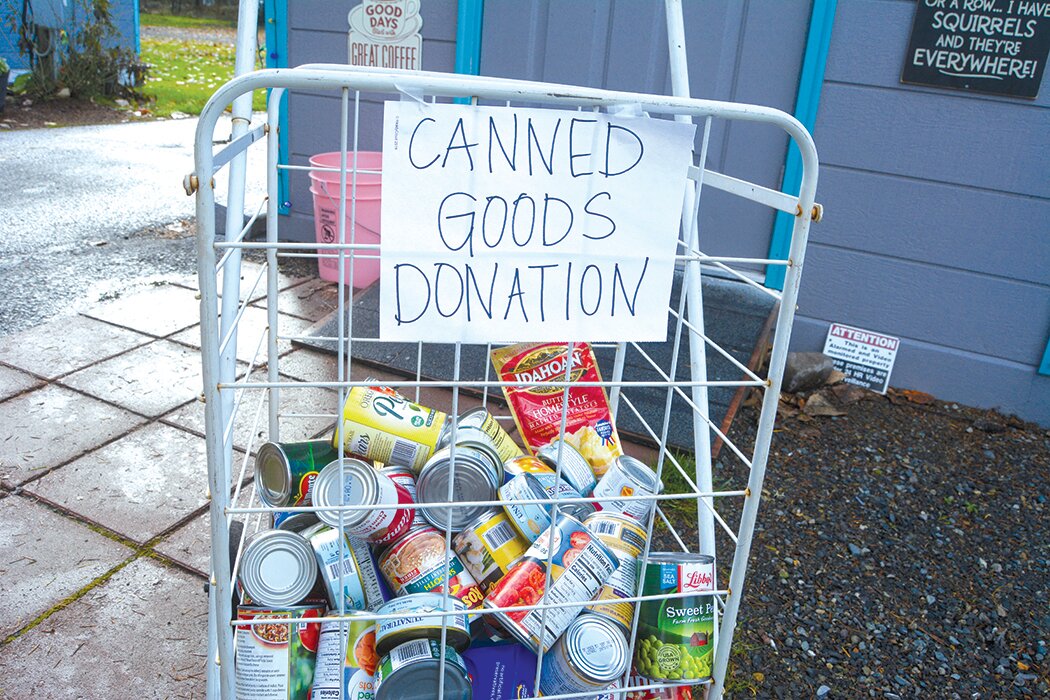 A look at some of the collected cans at the Rusty Kettle Espresso stand in McKenna on Nov. 30. The espresso shop is accepting canned goods or non-perishables through Dec. 15.
