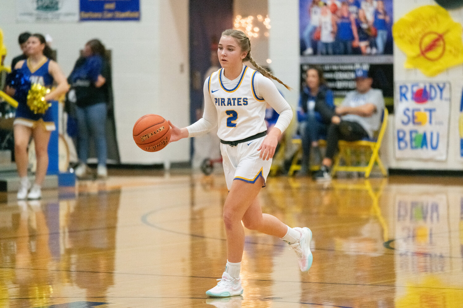 Danika Hallom dribbles up the court during the first half of Adna's 52-49 loss to Rainier on Dec. 8.