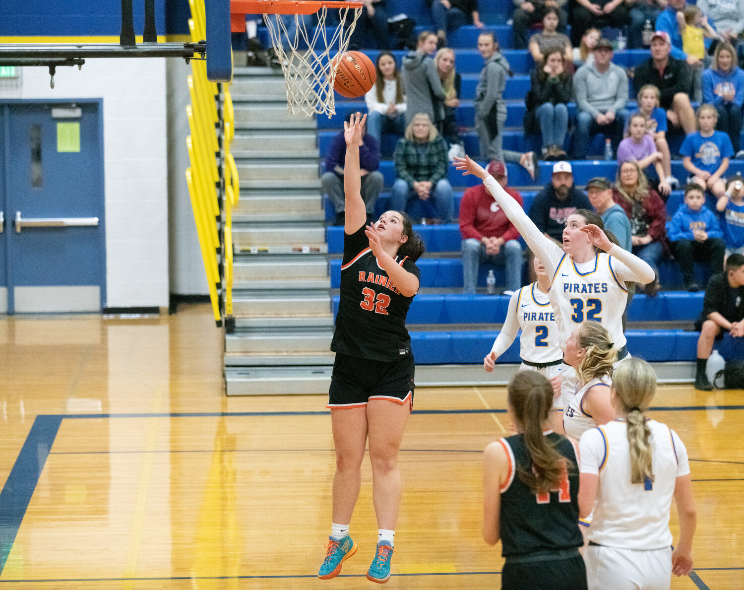 Haleigh Hanson goes up for a bucket in the paint during the second half of Rainier's 52-49 win at Adna on Dec. 8.