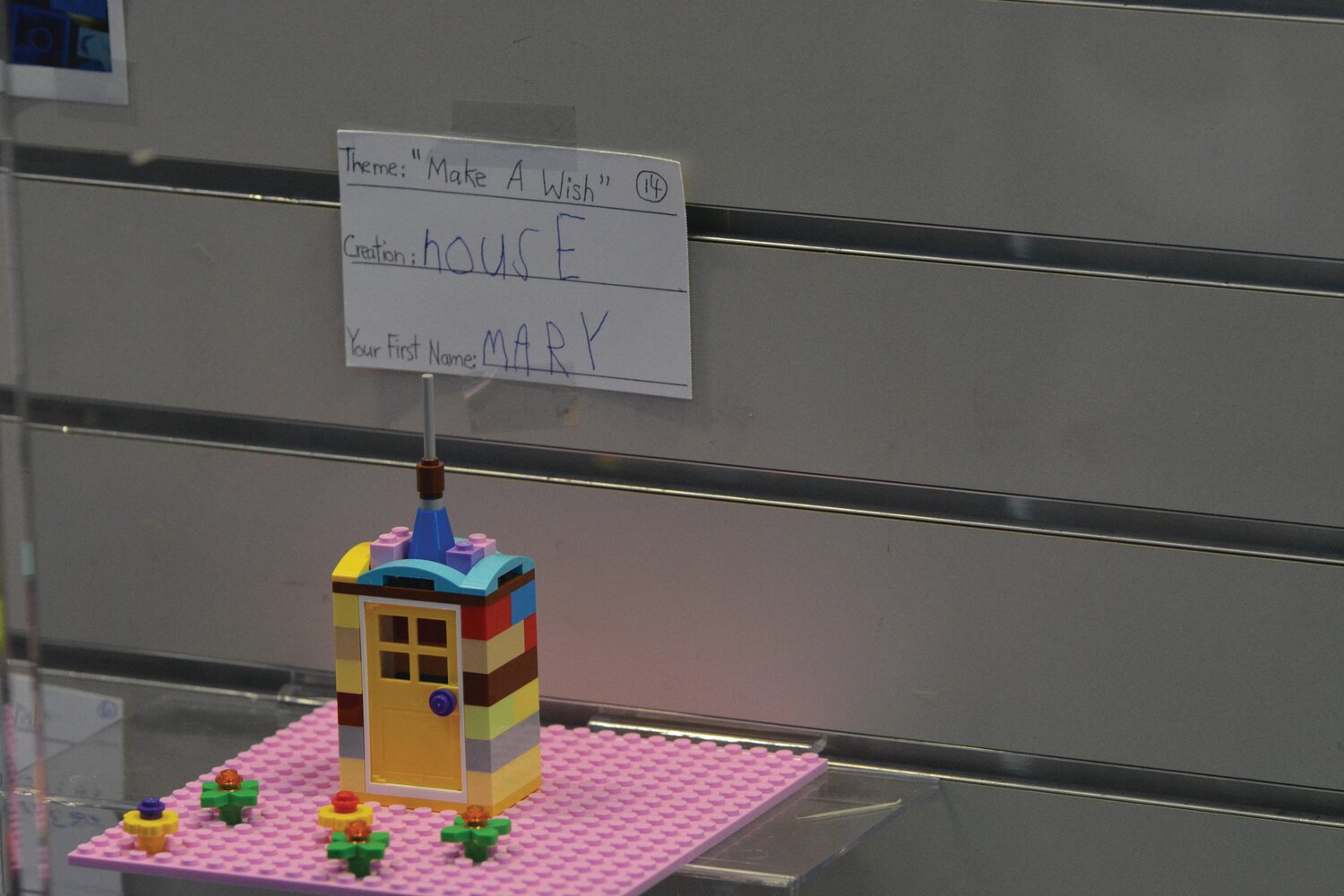 Mary, a young participant in the Yelm Timberland Library's LEGO Club, created a house under the "Make a Wish" theme for the build. Each of the LEGO builds is displayed at the library.