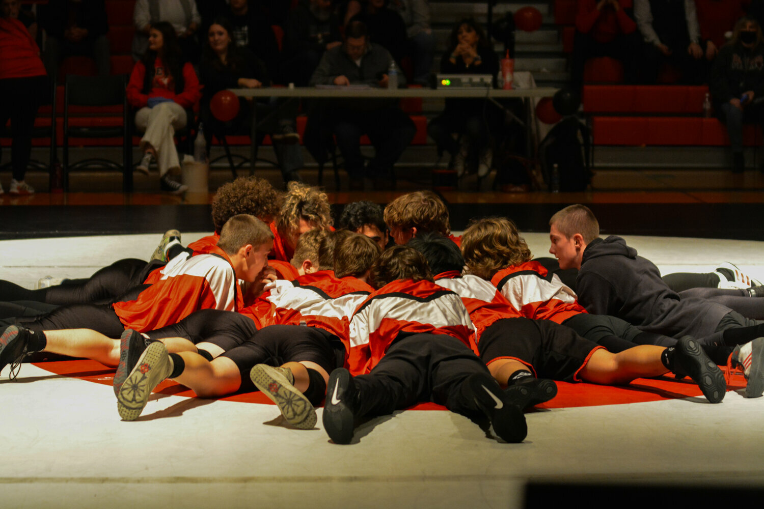 Yelm’s boys wrestling team storms the mat on Jan. 23, prior to the team’s “Bad to the Bone” dual against Bethel High School. The Tornados defeated the Bison, 37-36.