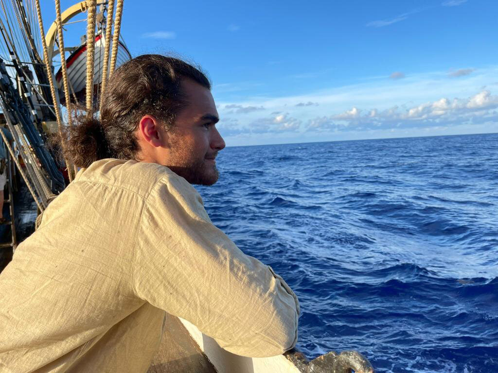 Julian Garcia stares into the ocean aboard the Picton Castle.