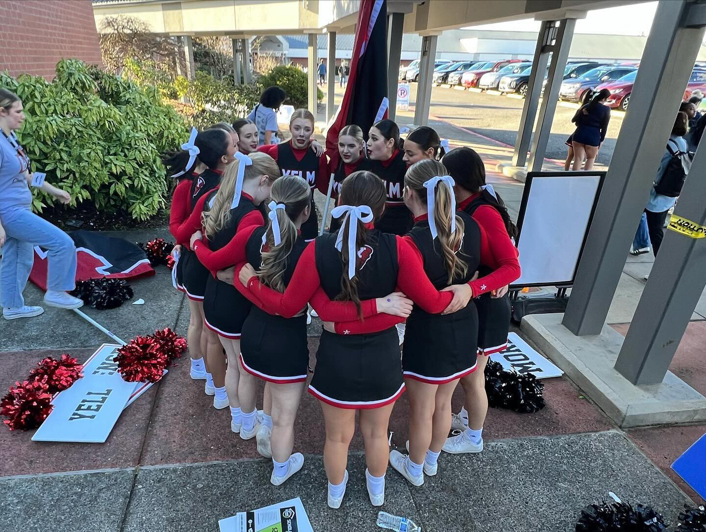 The YHS cheerleaders prepare to compete in the state championships in Battle Ground during the first weekend of February.